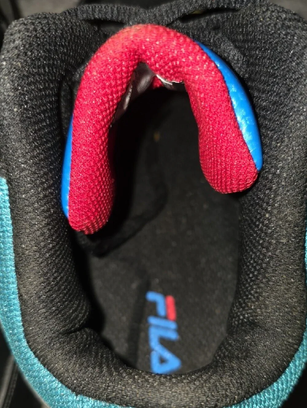 FILA Black High-Top Sneakers with Yellow and Blue Accents